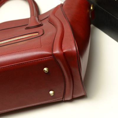 L-207高端大牌工藝古典復(fù)古笑臉牌殺手包 時尚與復(fù)古的完美融合